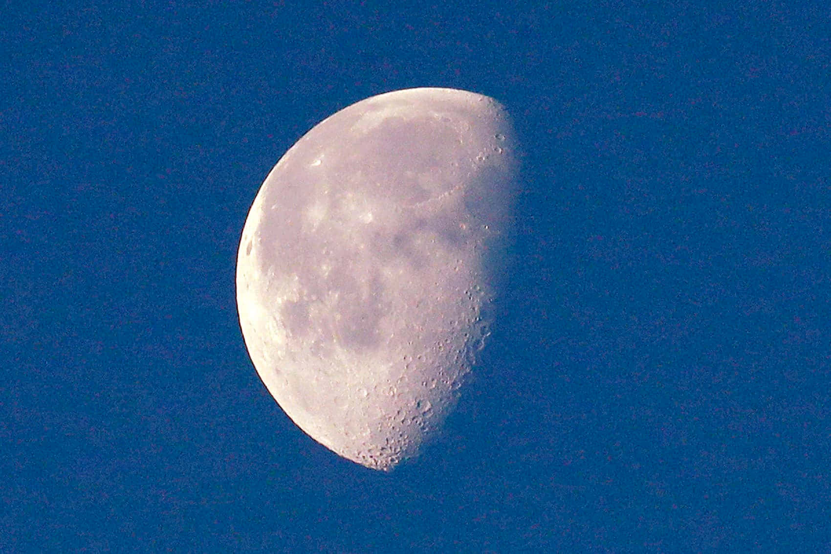 Waning_ Gibbous_ Moon_ Against_ Blue_ Sky.jpg Wallpaper