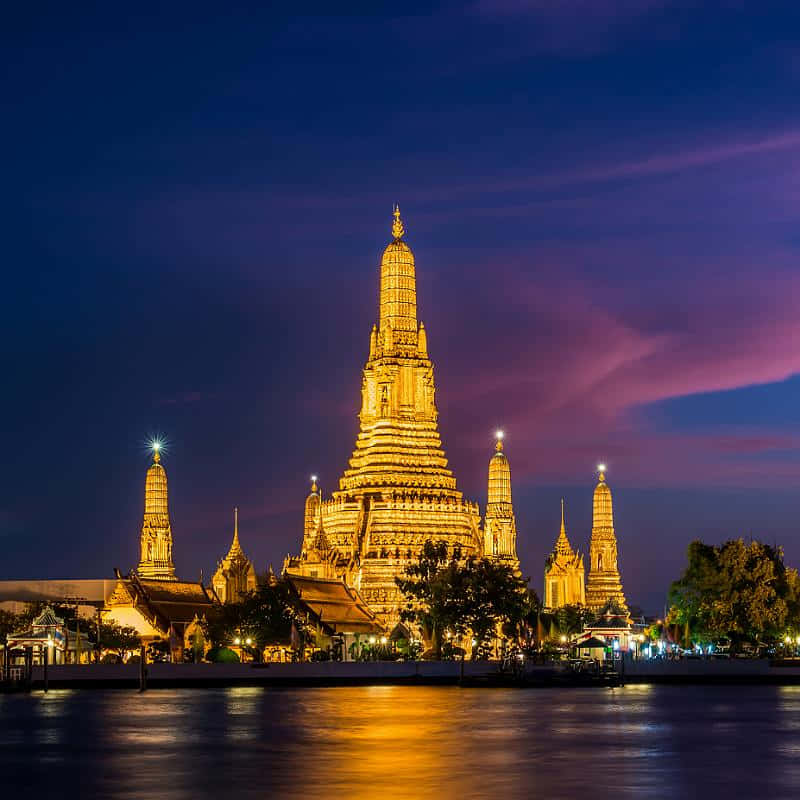 Wat Arun With Yellow Lights Wallpaper