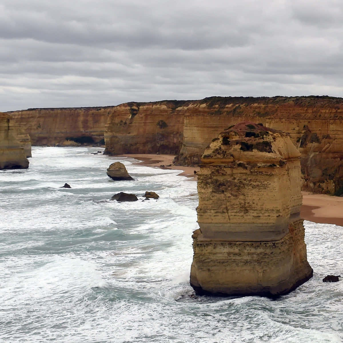 Waves Crashing In Twelve Apostles In Victoria Australia Wallpaper