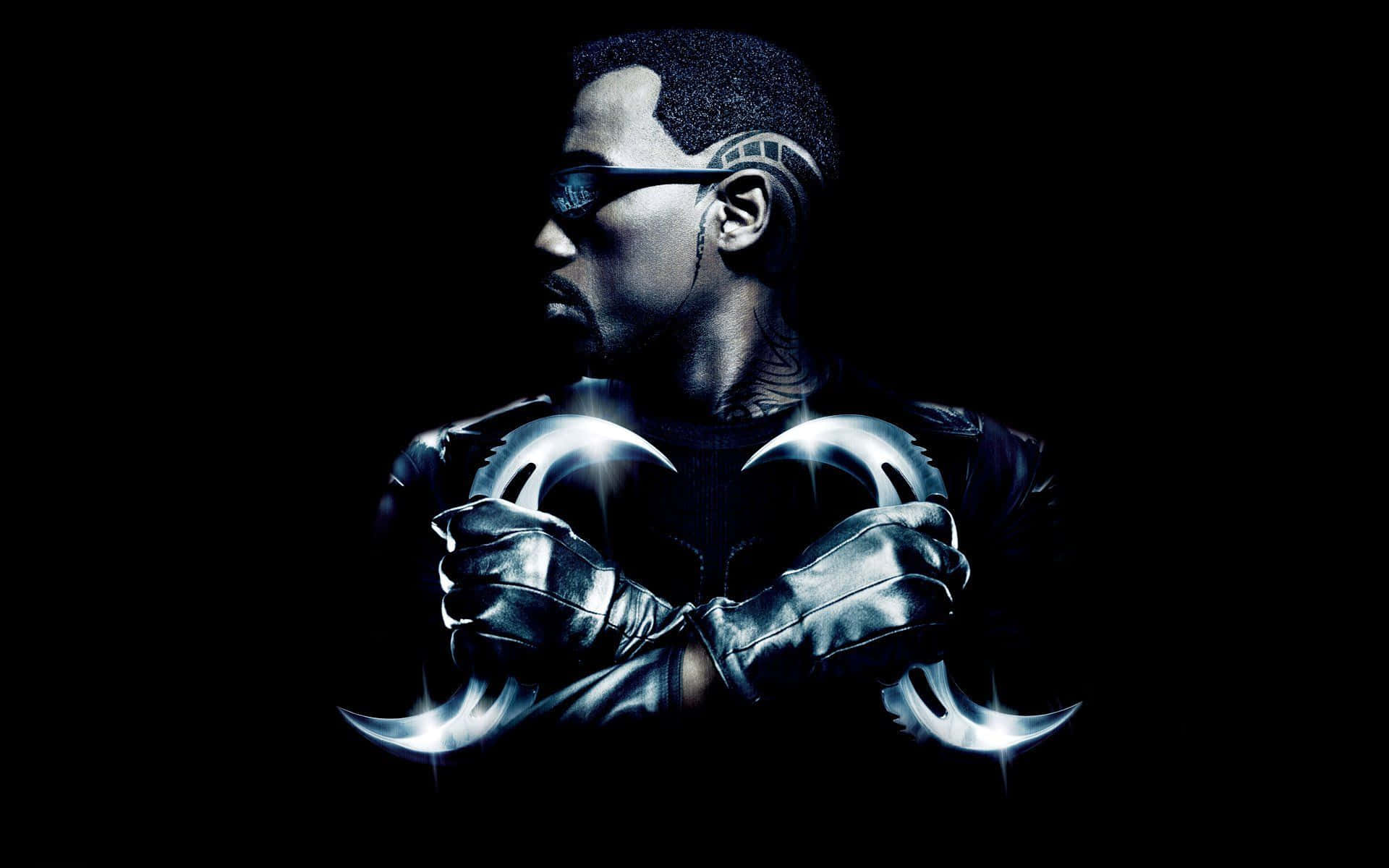 Wesley Snipes Striking A Powerful Pose In A Dynamic Setting. Wallpaper