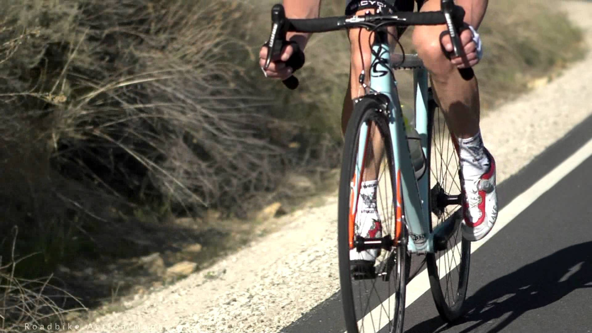 White Road Bike In Road Wallpaper