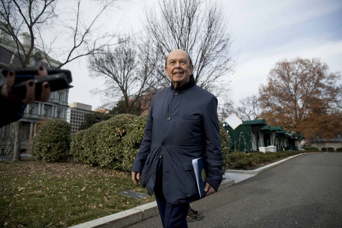 Wilbur Ross Walking Outdoors Wallpaper