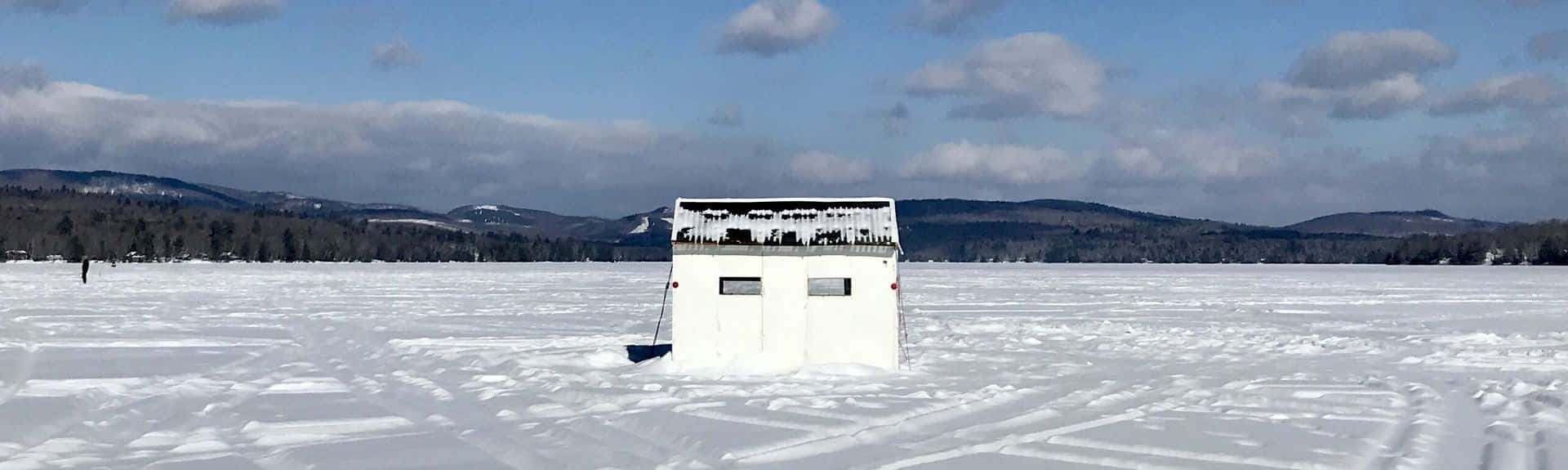 Winter Ice Fishing Shackon Frozen Lake Wallpaper