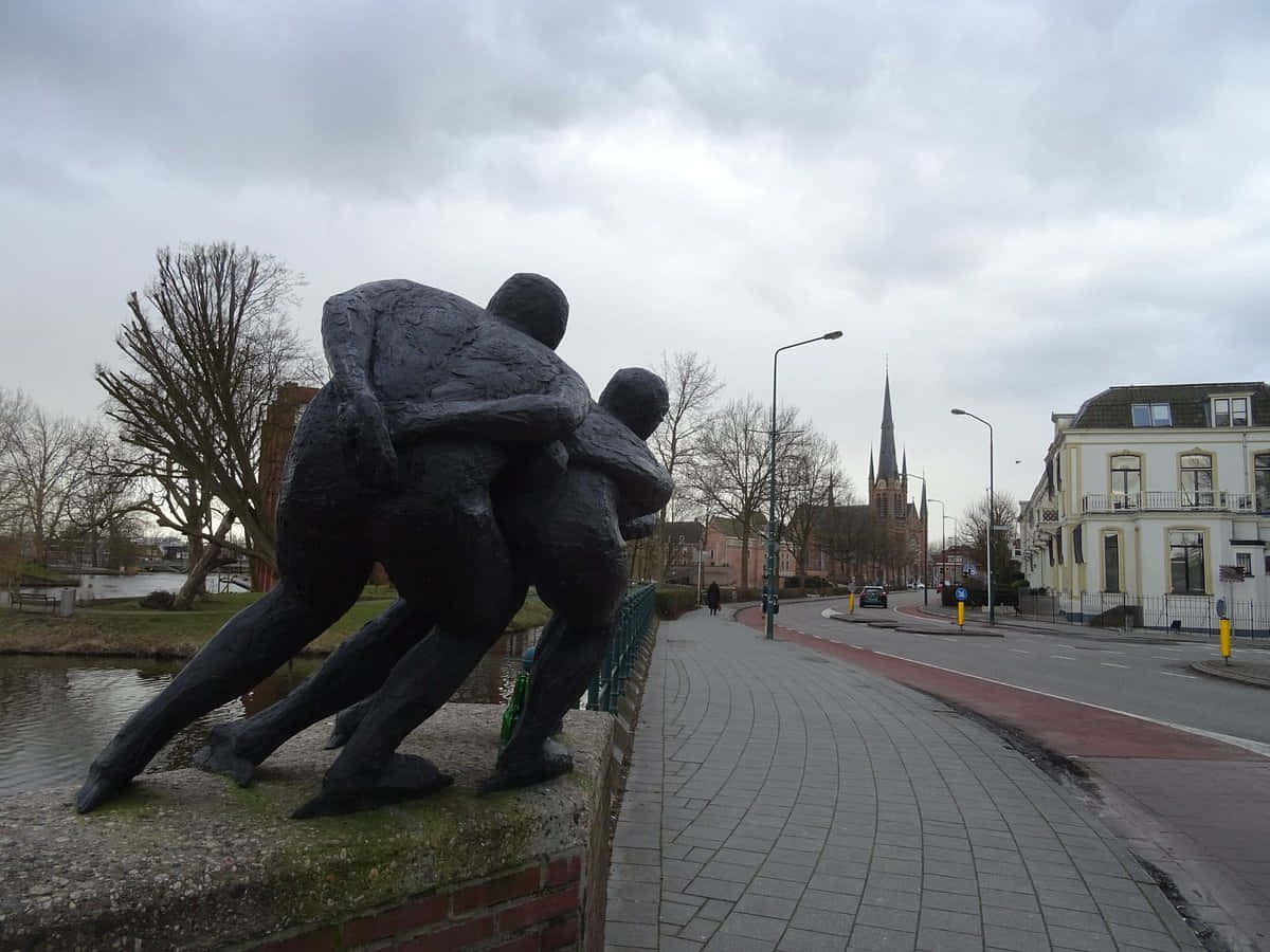 Woerden Sculpture Overlooking Canal Wallpaper