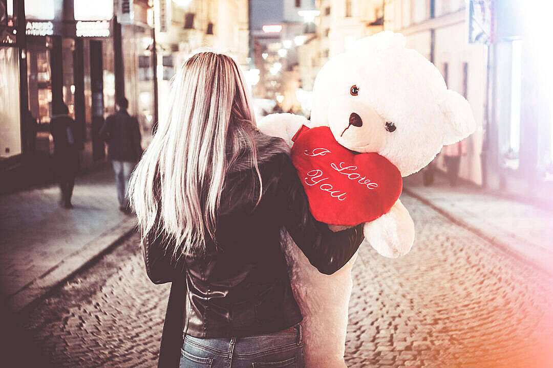 Woman And A Cute Teddy Bear Wallpaper