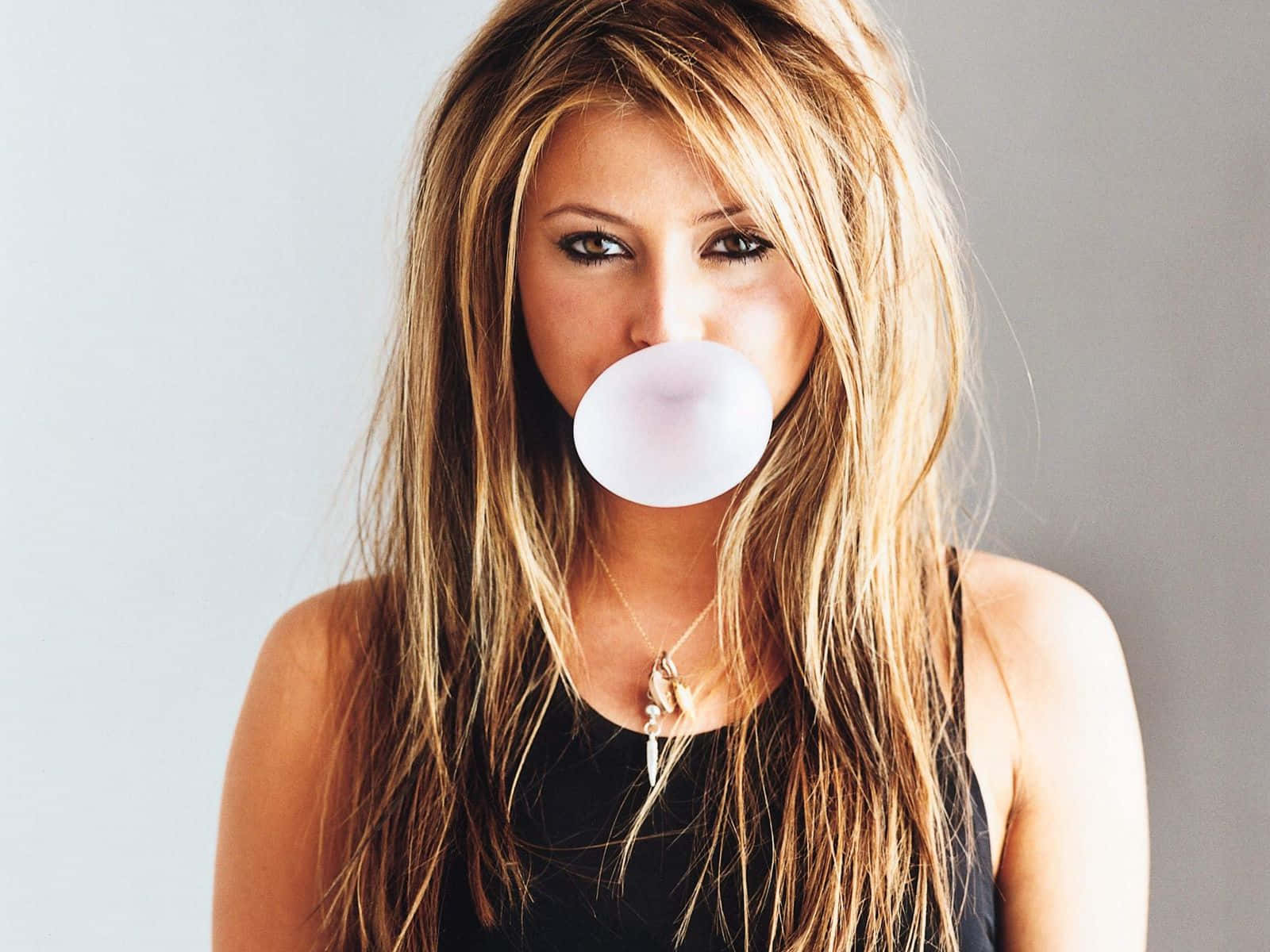 Woman Blowing Bubblegum Wallpaper