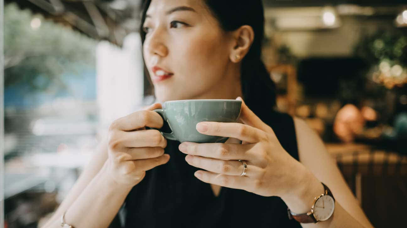 Woman Enjoying Morning Coffee Wallpaper