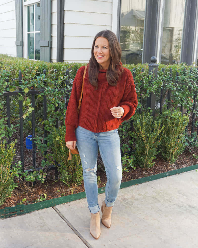 Woman In Cozy Red Sweater Wallpaper