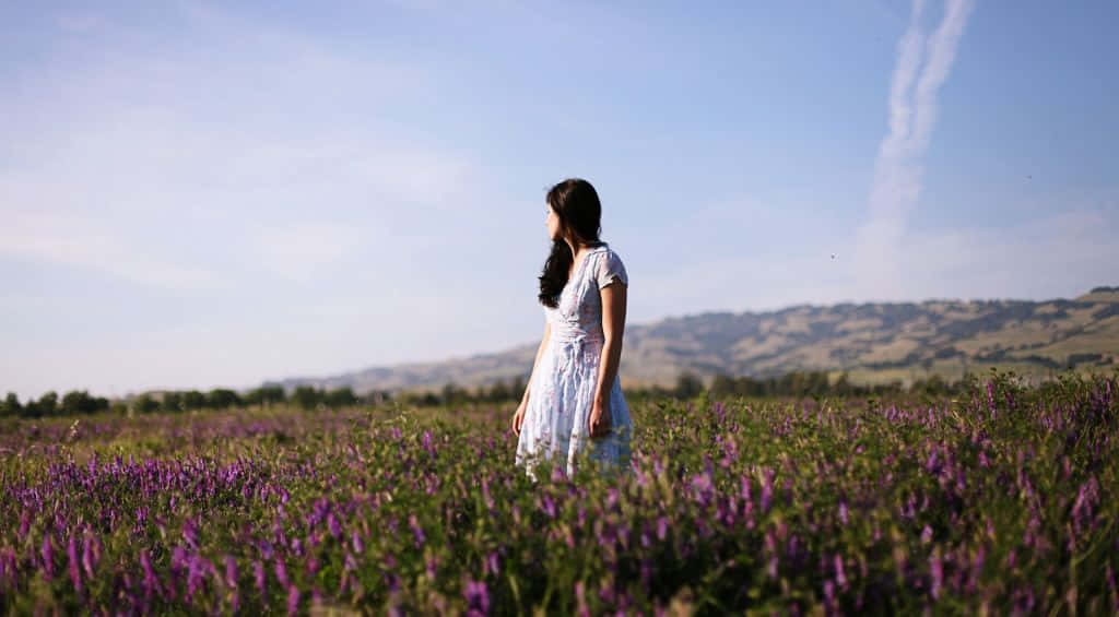 Woman In White Dress Waiting For The Sun Wallpaper