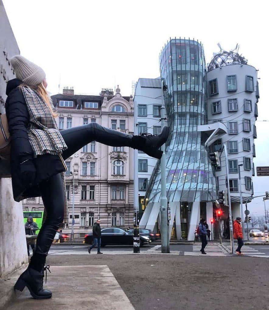 Woman Kicking The Dancing House Wallpaper