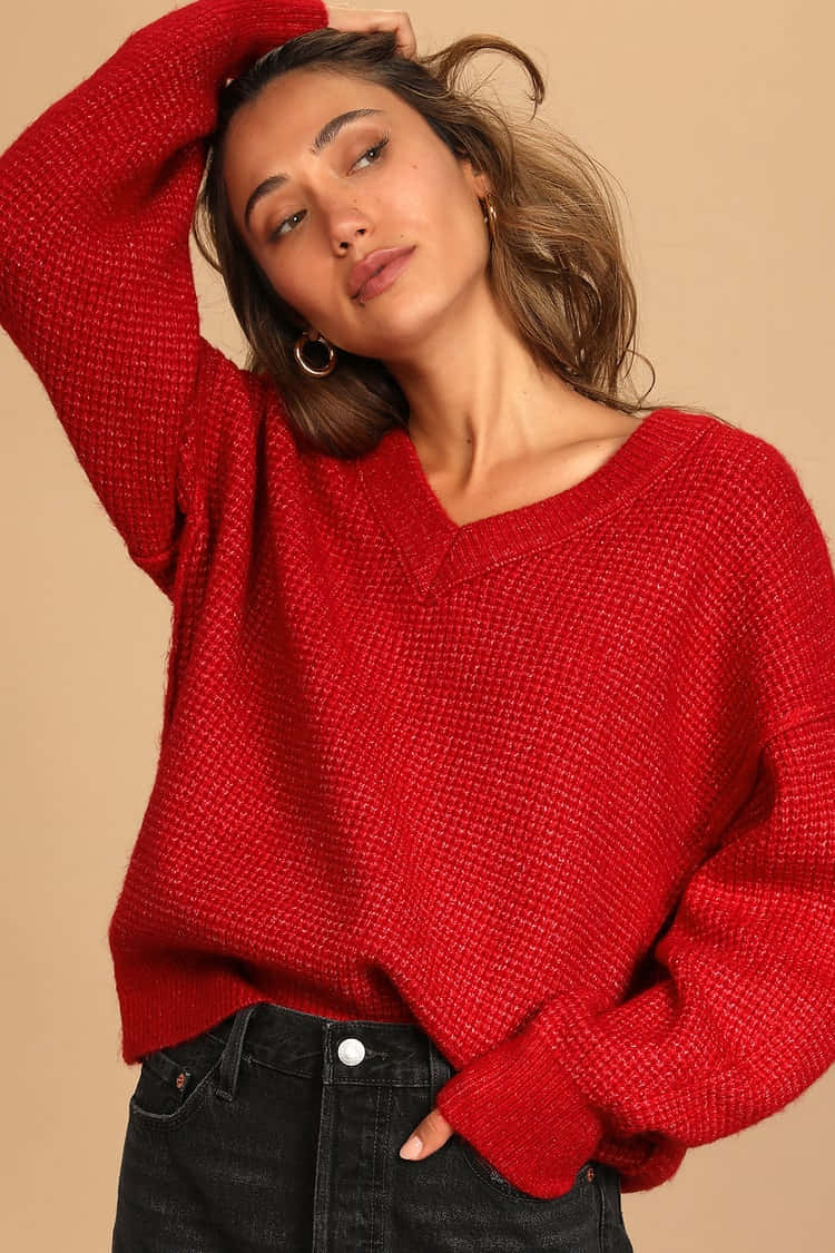 Woman Wearing A Stylish Red Sweater Wallpaper