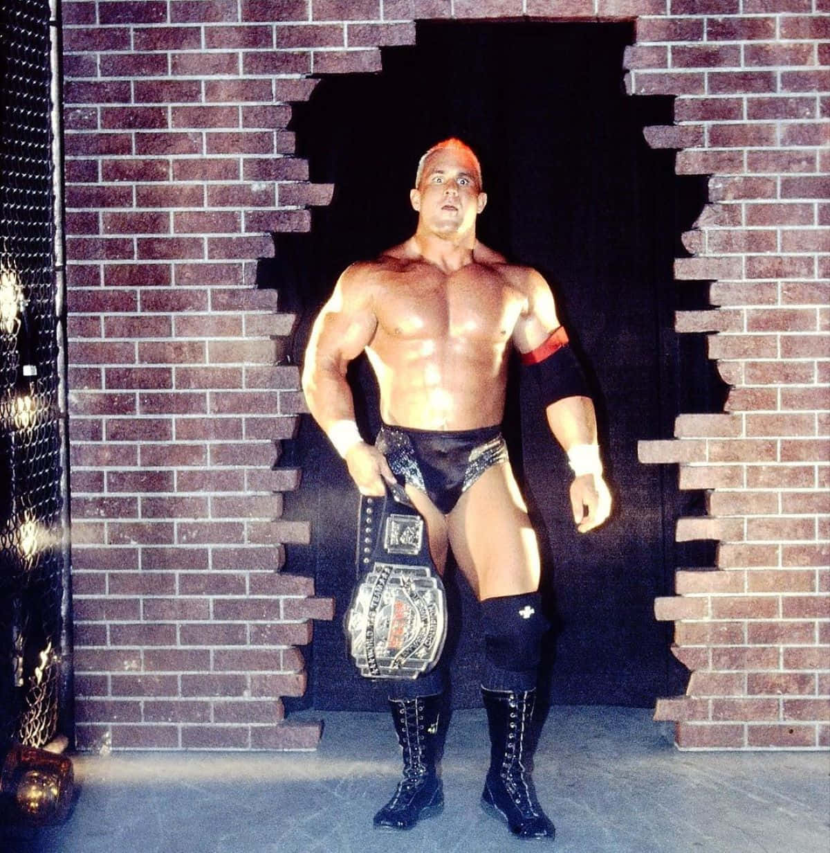 Wrestler_with_ Championship_ Belt_ Entryway Wallpaper