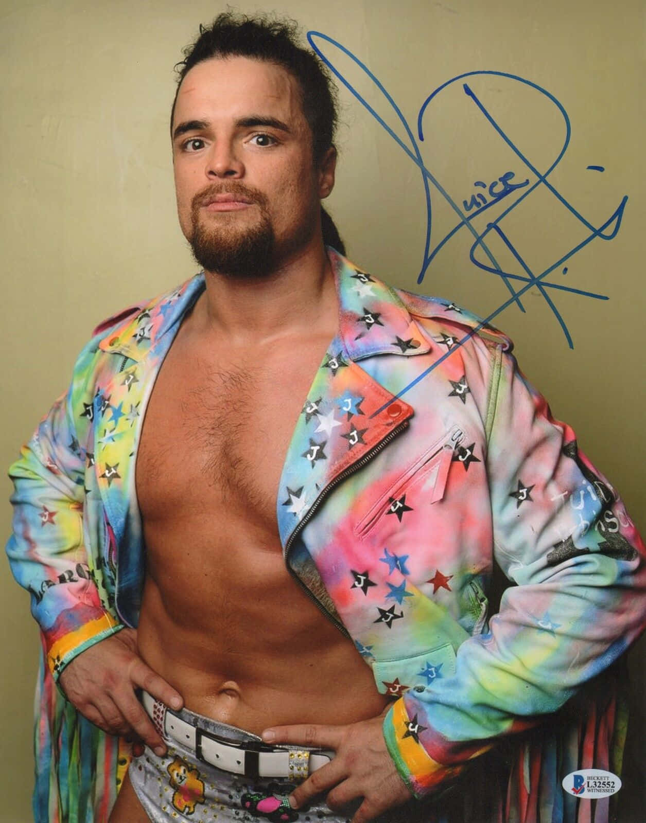 Wrestling Icon Juice Robinson In Vibrant Suit Wallpaper