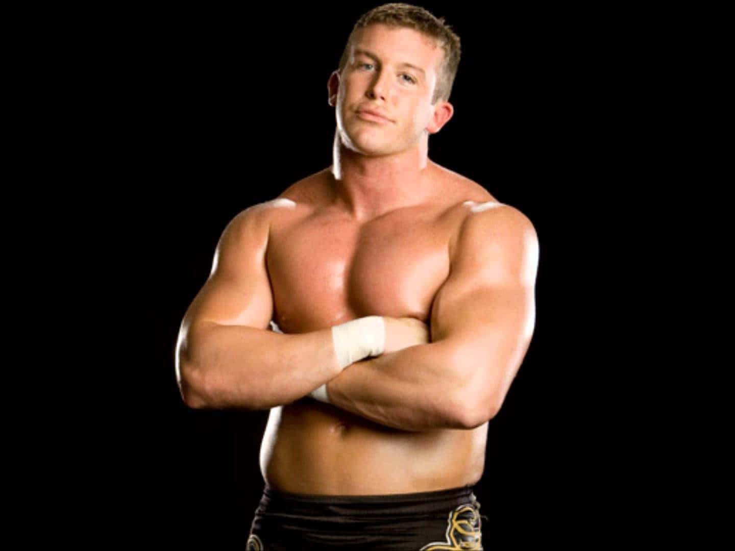 Wrestling Pro, Ted Dibiase Jr. In A Confident Stance Wallpaper