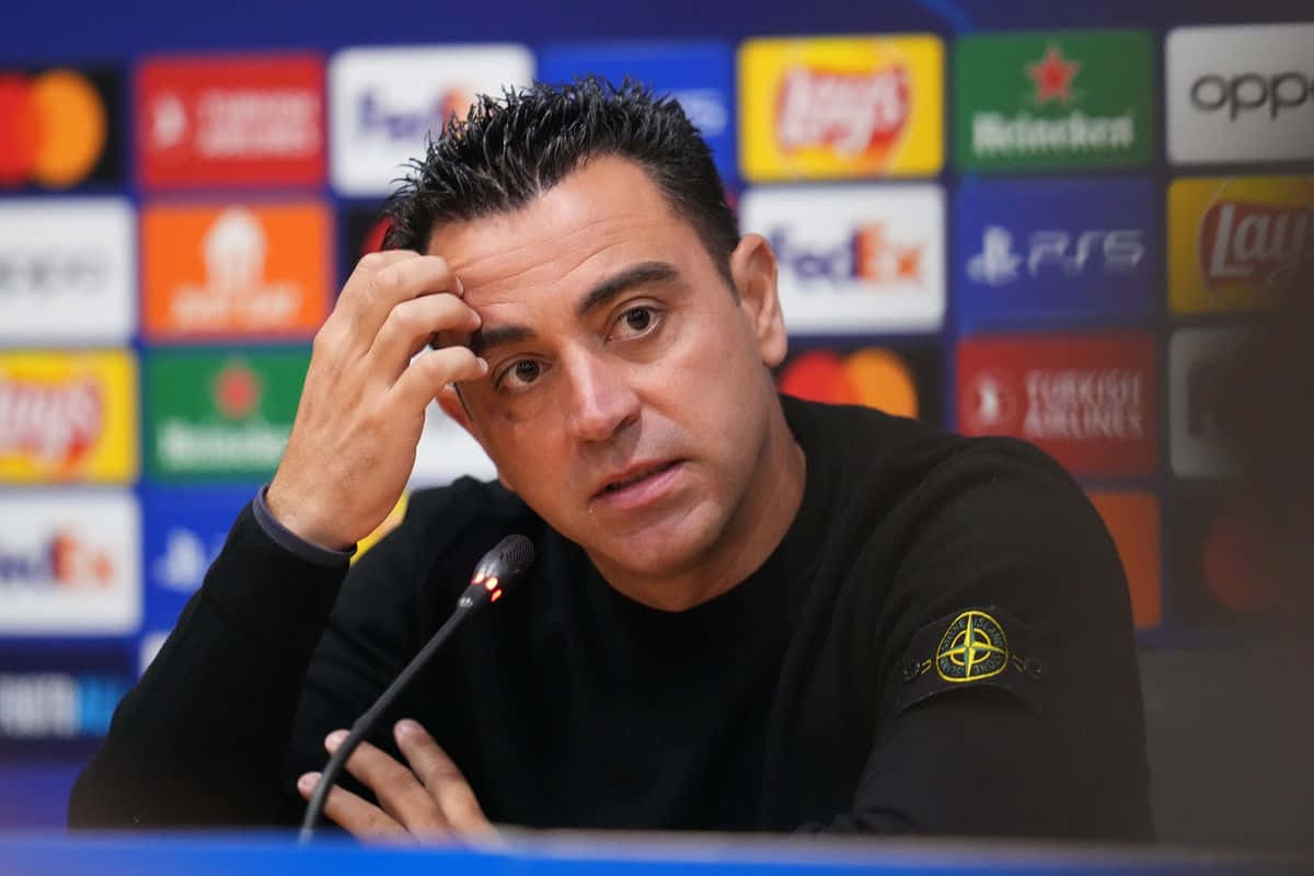 Xavi Concerned During Press Conference Wallpaper