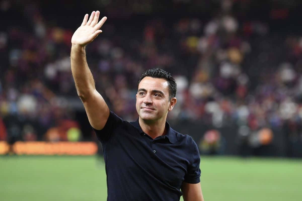 Xavi Wavingto Fans Wallpaper