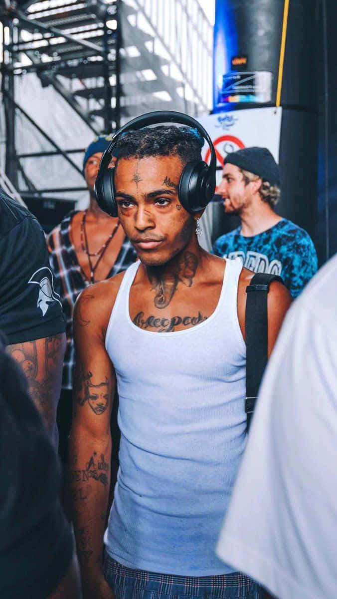 Xxxtentacion Sporting Bright Blue Hair Wallpaper