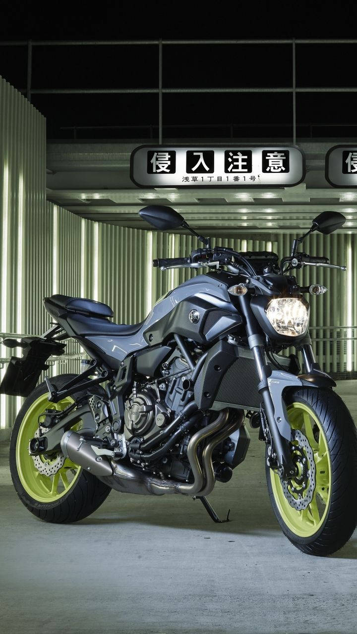 Yamaha Mt 15 With Yellow Green Rims Wallpaper