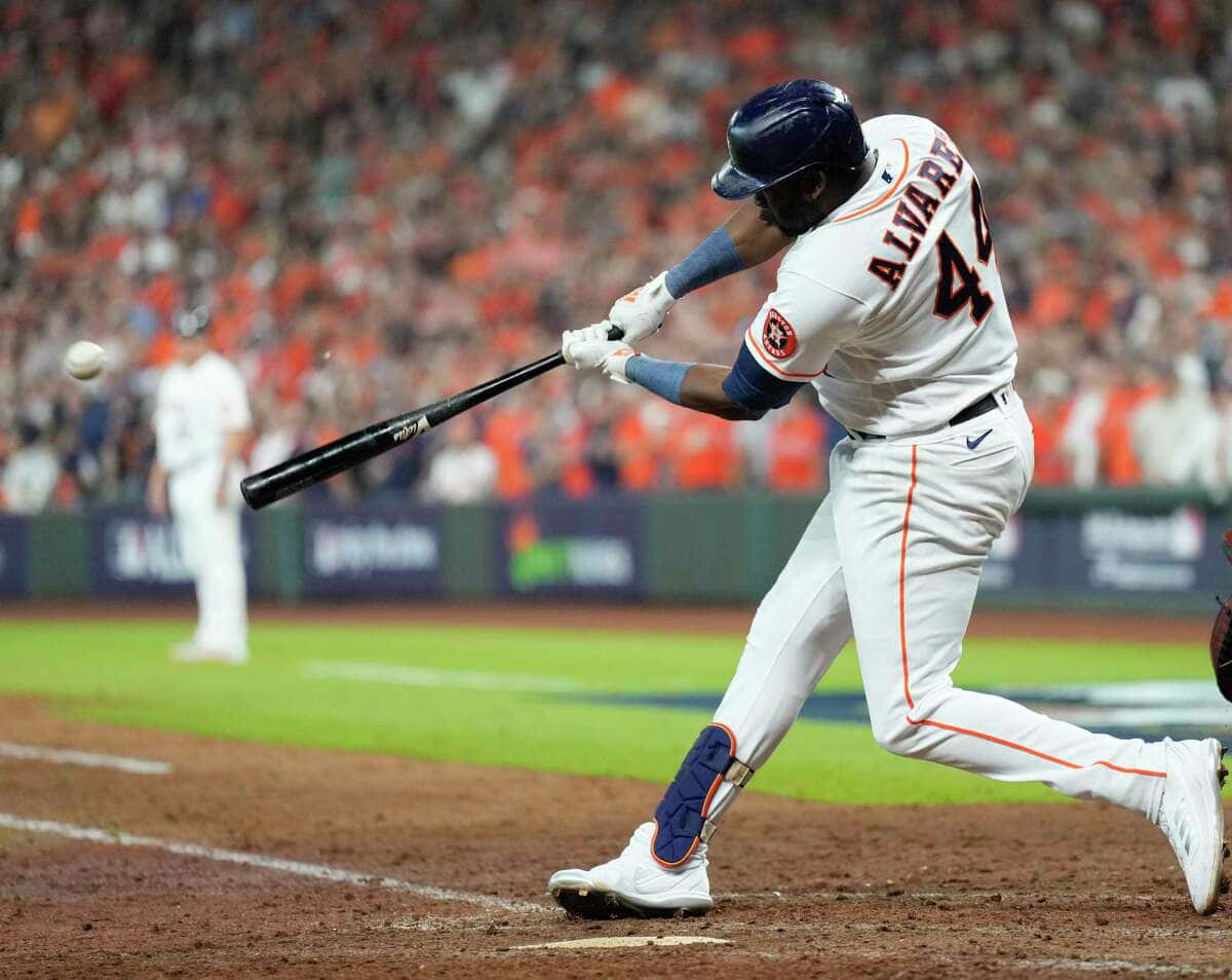 Yordan Alvarez Powerful Swing Baseball Action Wallpaper