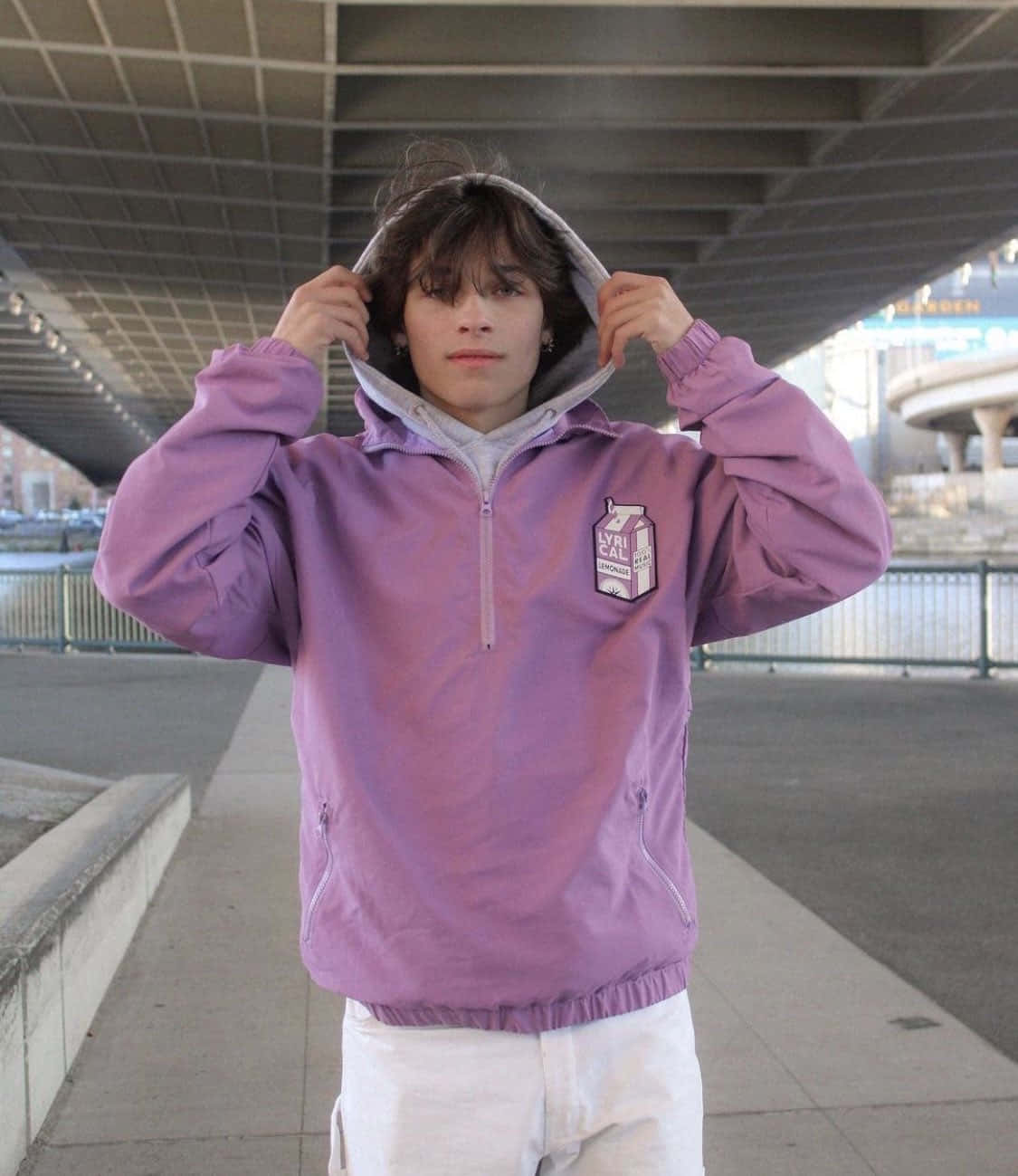 Young Man Purple Hoodie Urban Backdrop Wallpaper