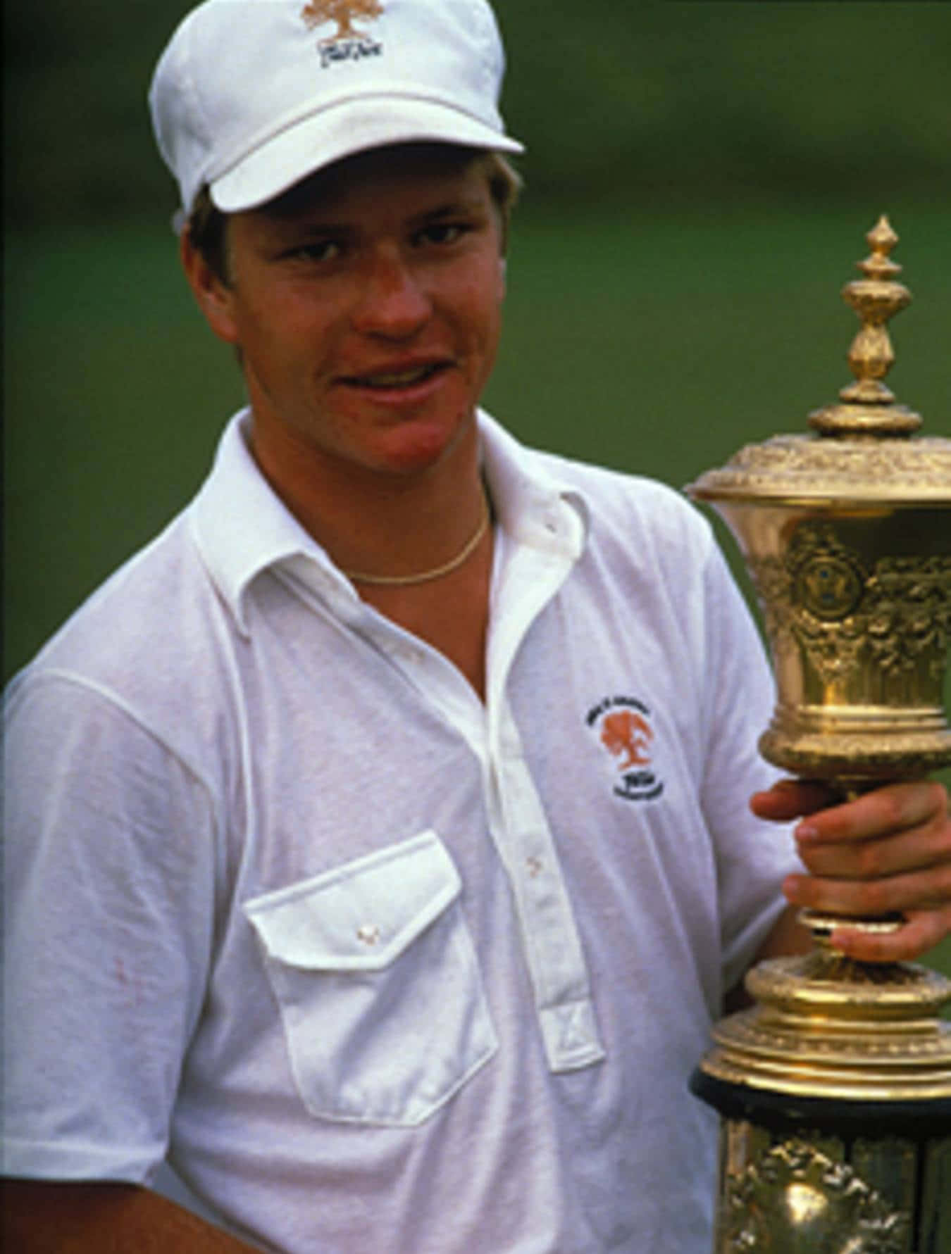 Young Scott Verplank Holding Trophy Wallpaper