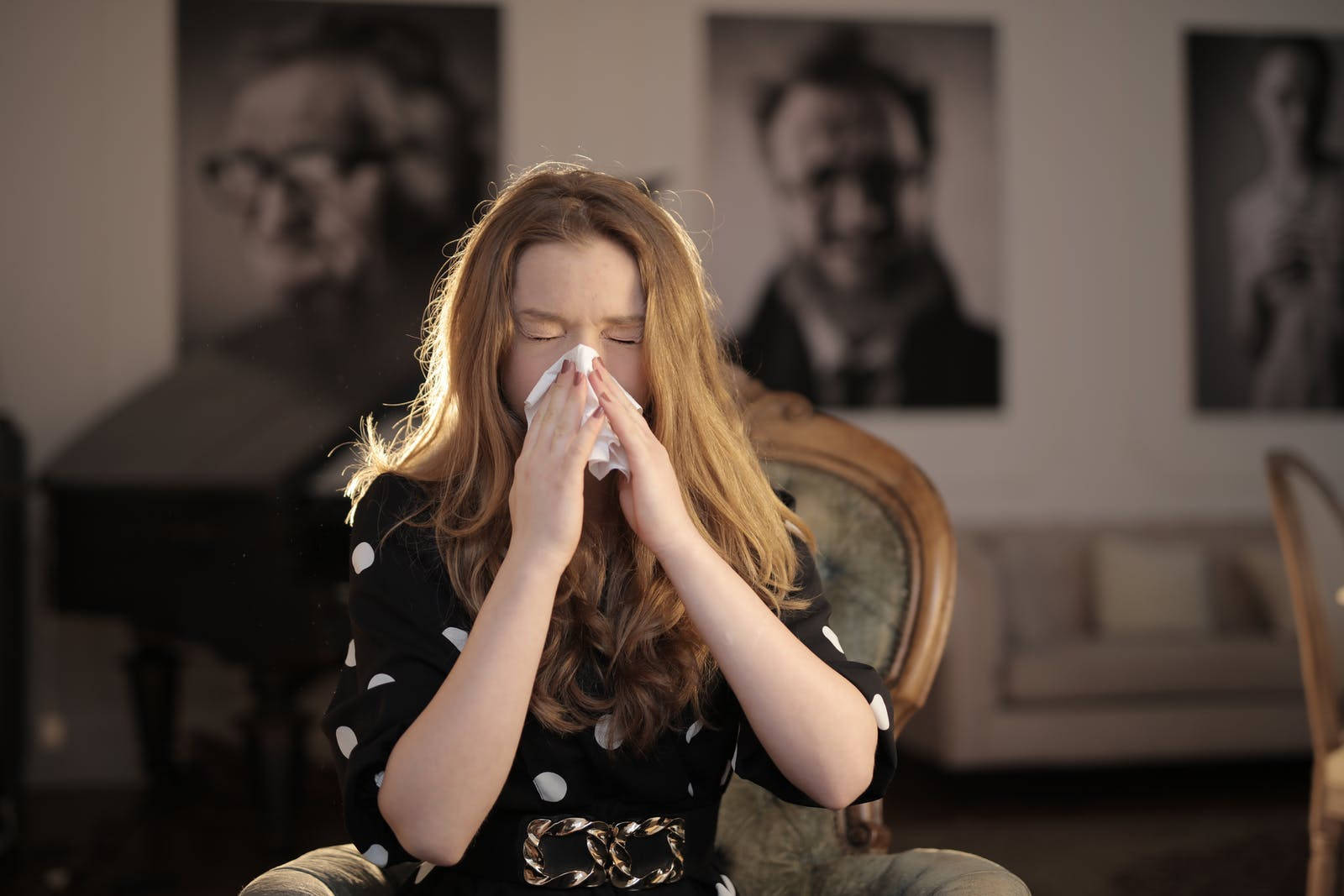 Young Woman Middle Of Sneeze Wallpaper