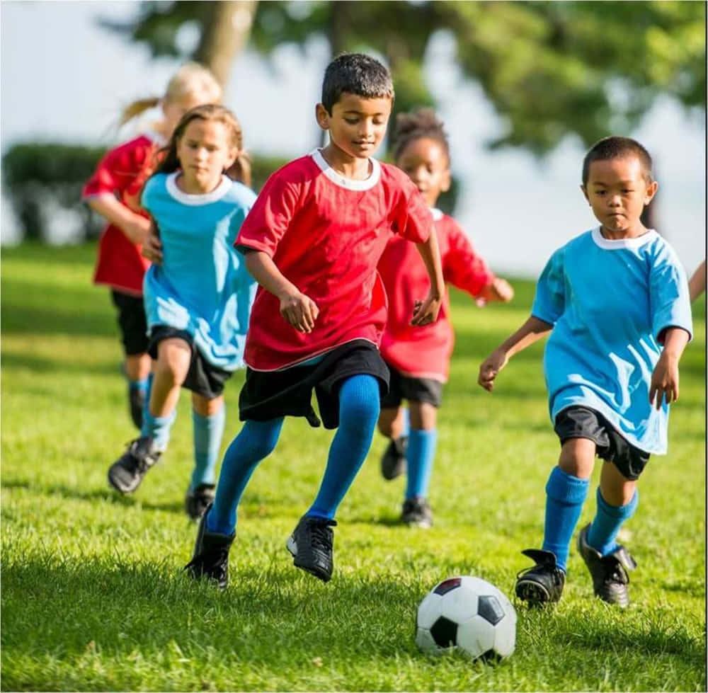 Youth Soccer Game Action.jpg Wallpaper