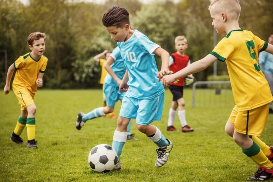 Youth Soccer Match Action.jpg Wallpaper