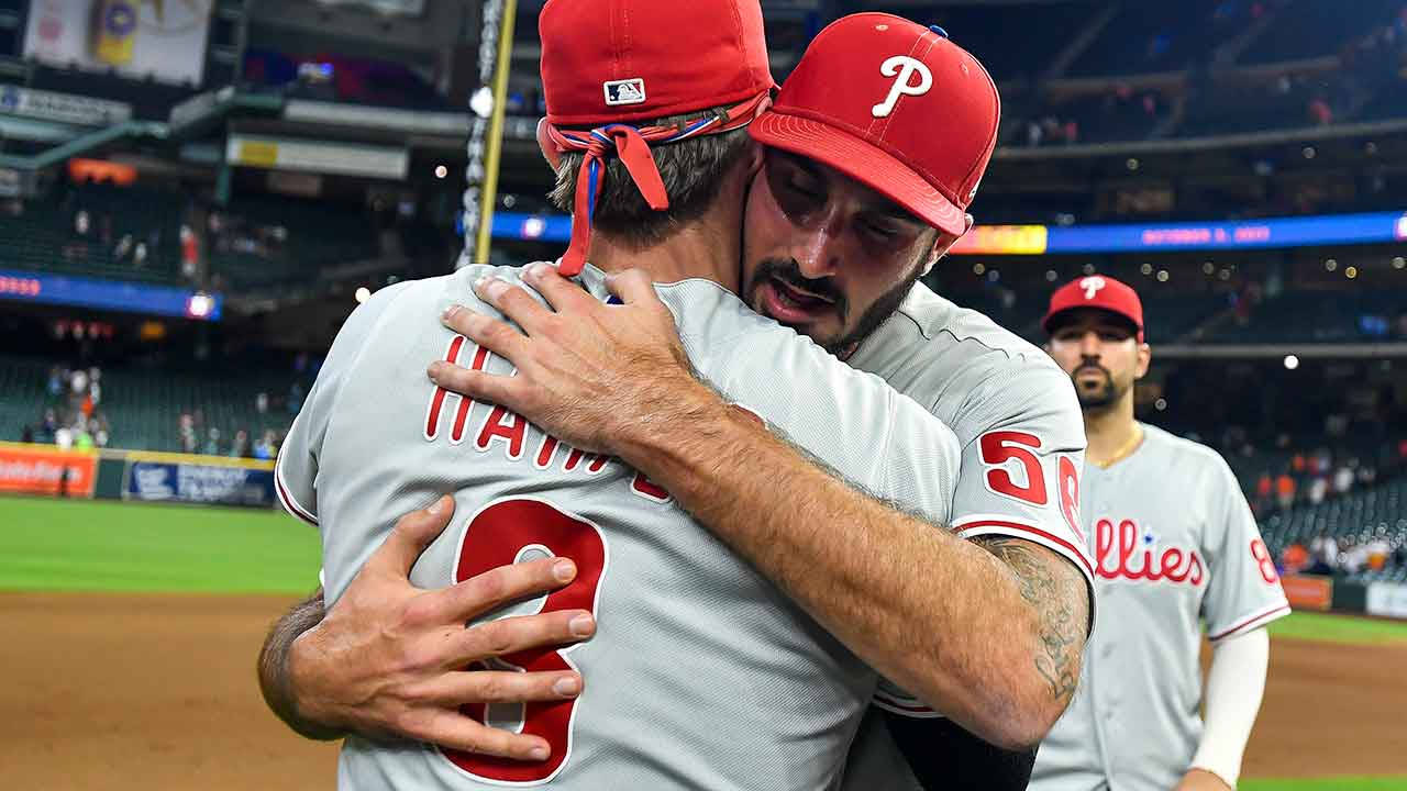 Zach Eflin Hugging His Teammate Wallpaper