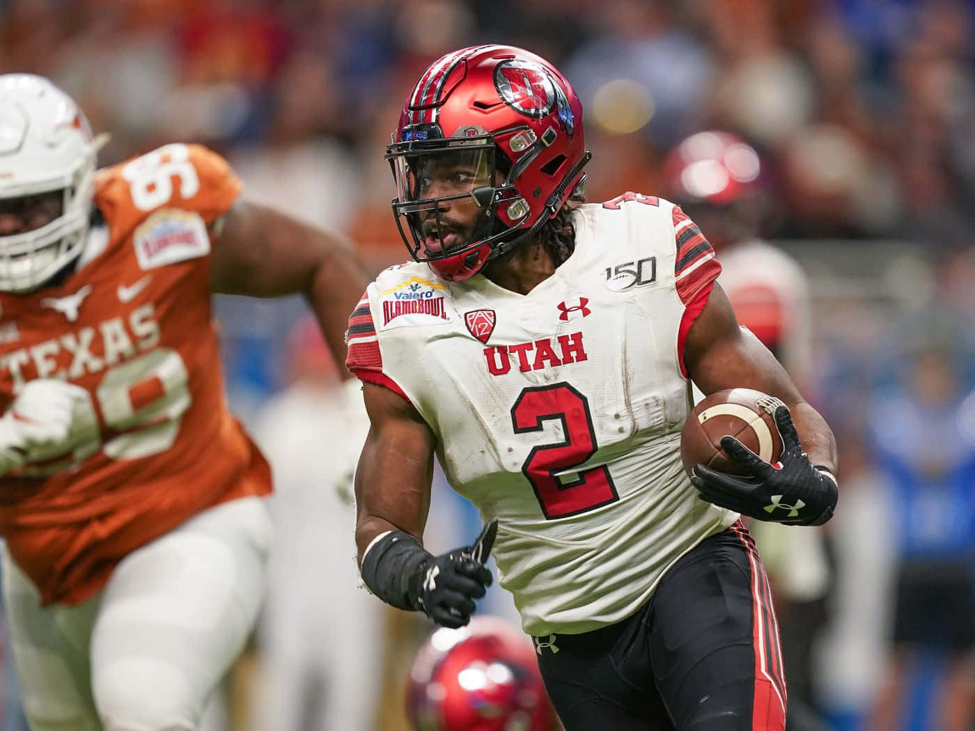 Zack Moss Utah Football Action Wallpaper