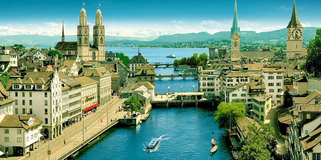 Zurich Cityscapewith River Limmat Wallpaper