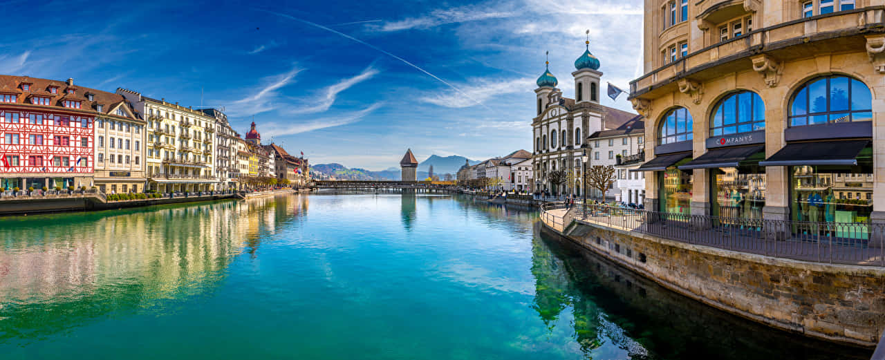 Zurich Riverfront Panorama Wallpaper