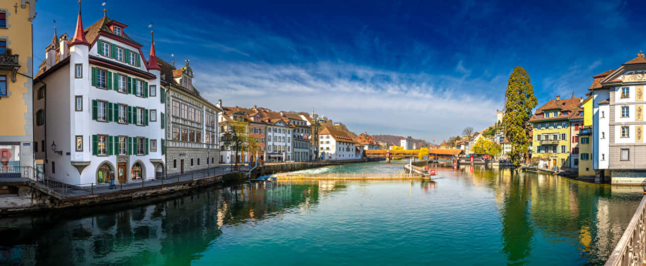 Zurich Riverfront Panorama Wallpaper