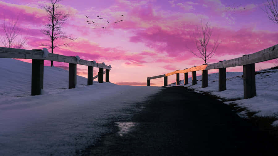2048x1152 Aesthetic Snowy Road With Pink Sky Wallpaper