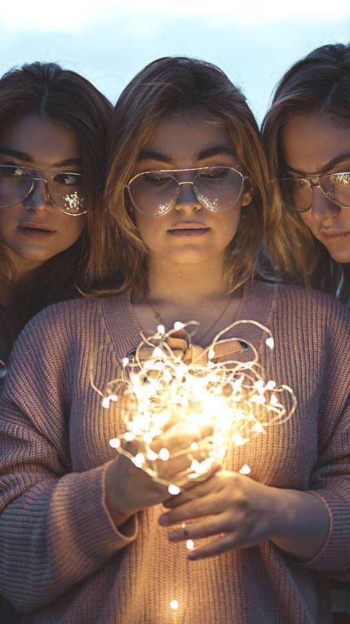 3 Best Friends With Fairy Lights Wallpaper