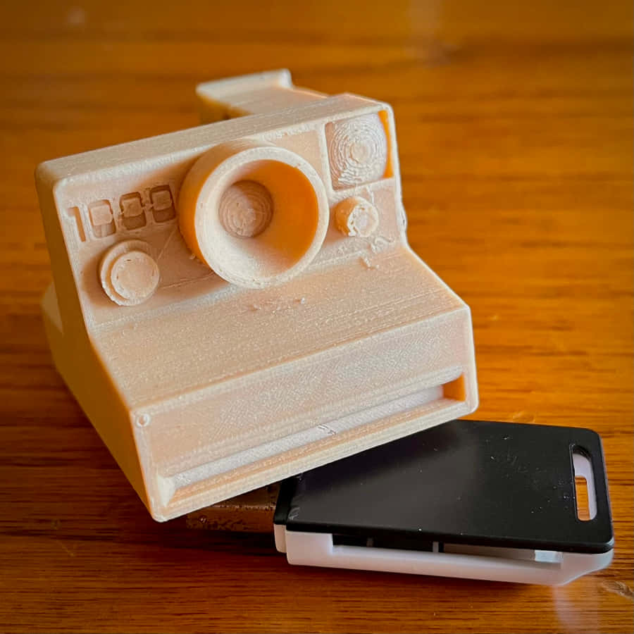 3 D Printed Polaroid Camera Design Wallpaper