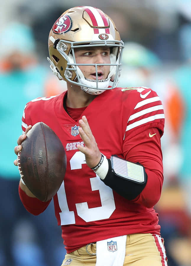 49ers Quarterback Prepping Pass Wallpaper