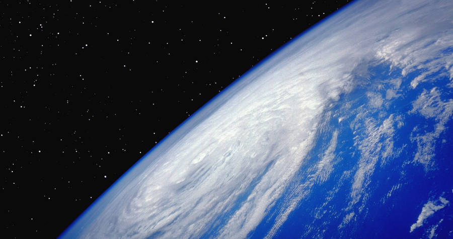 4k Earth Swirly Clouds Wallpaper