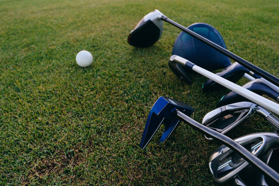 4k Golf Clubs And Ball Wallpaper