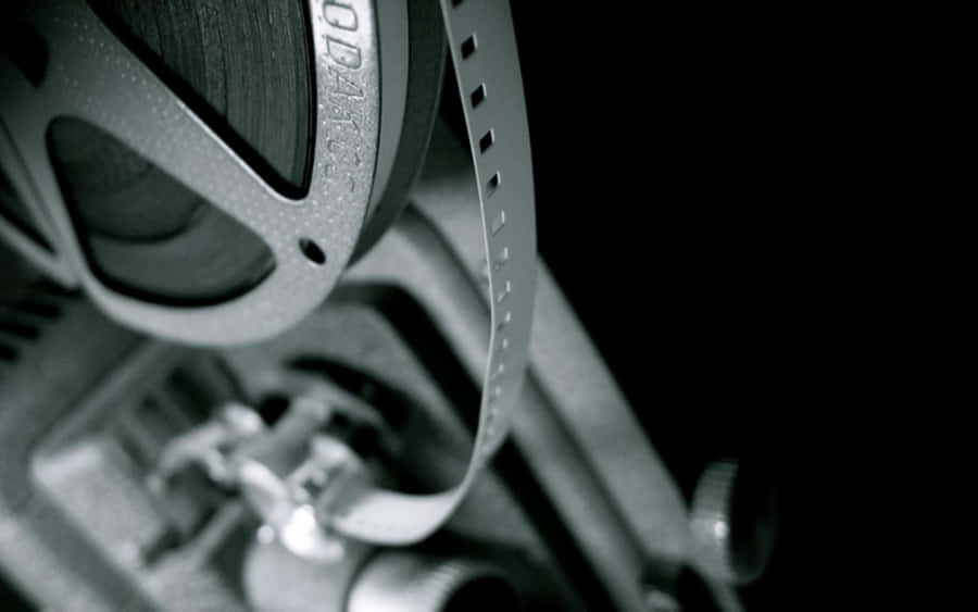 A 4k Projector Illuminating A Movie Night Wallpaper