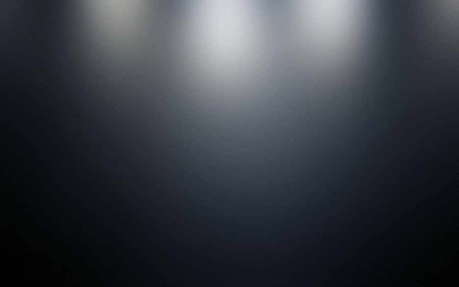 A Background Blending Deep Black To Light Grey Wallpaper