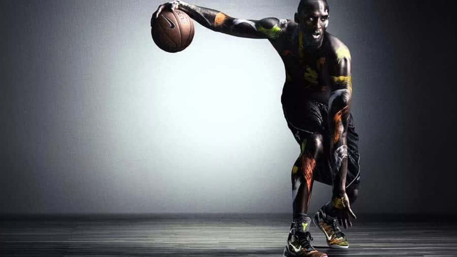 A Basketball Player Is Holding A Ball In His Hands Wallpaper