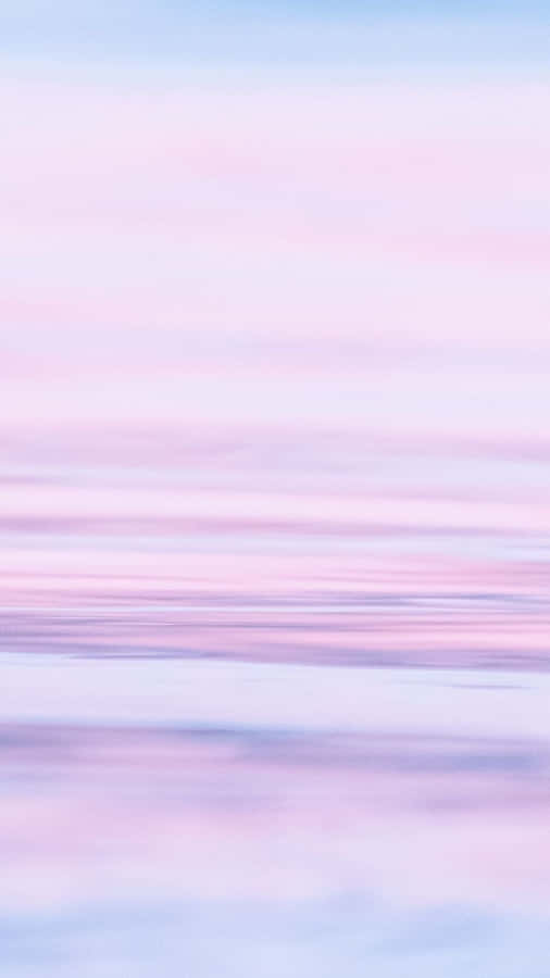 A Beautiful Landscape Of Pastel Blue And Pink Wallpaper