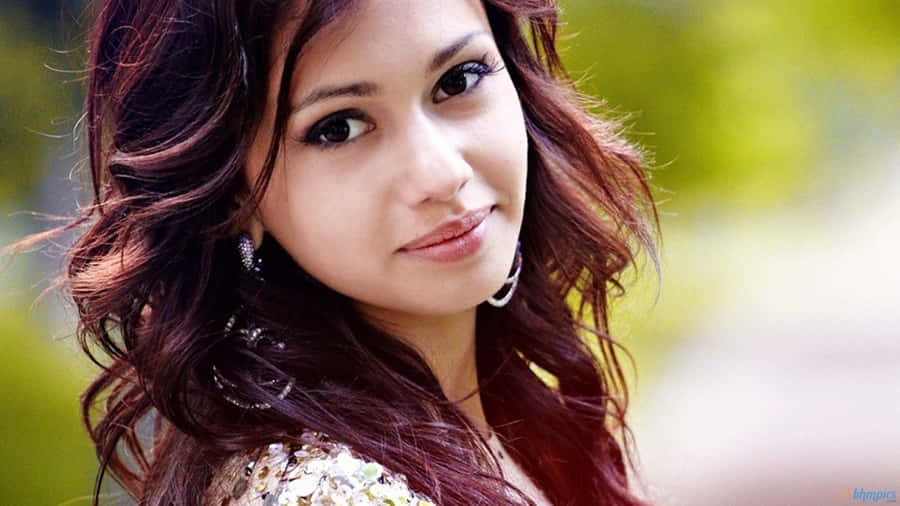 A Beautiful Young Woman With Long Hair Wallpaper