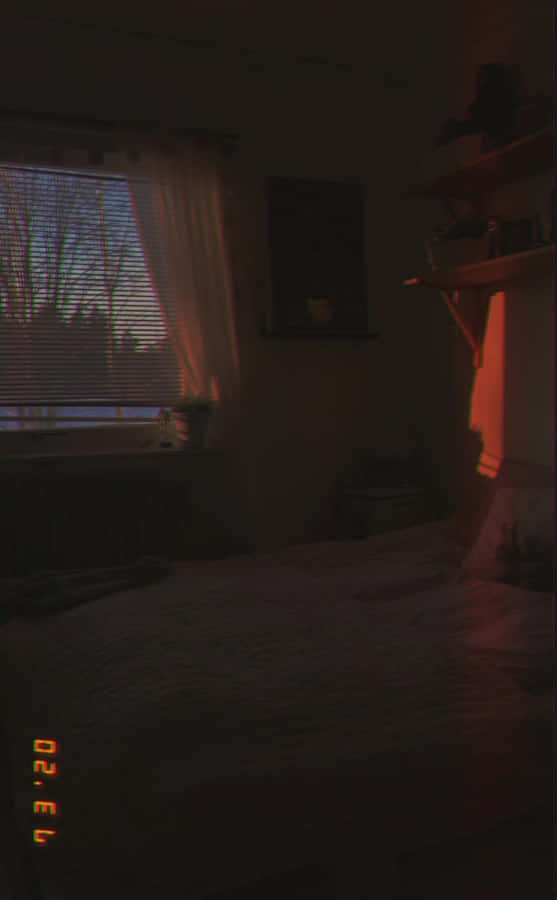 A Bed With A Blanket On It Wallpaper