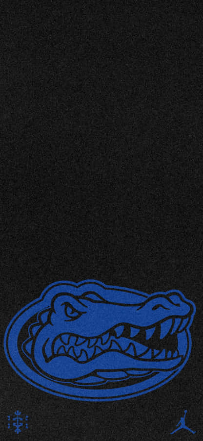A Black And Blue Gator Logo On A Black Background Wallpaper