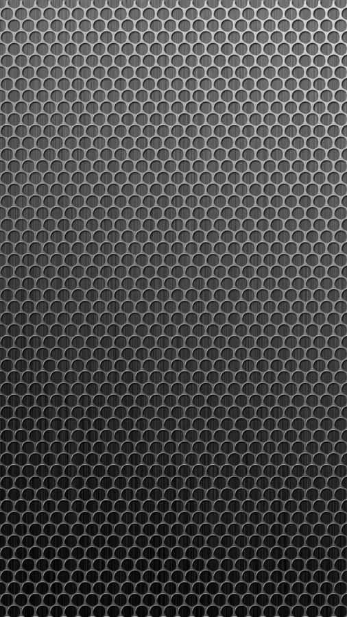 A Black And White Metal Mesh Background Wallpaper