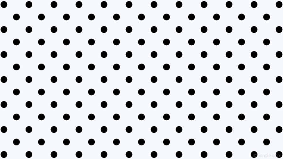 A Black And White Polka Dot Pattern Wallpaper