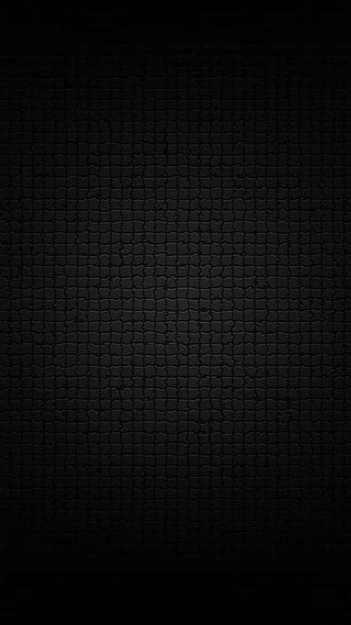 A Black Background With A Brick Pattern Wallpaper