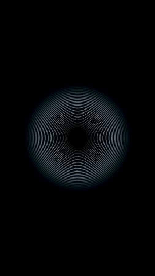 A Black Background With A Circular Pattern Wallpaper